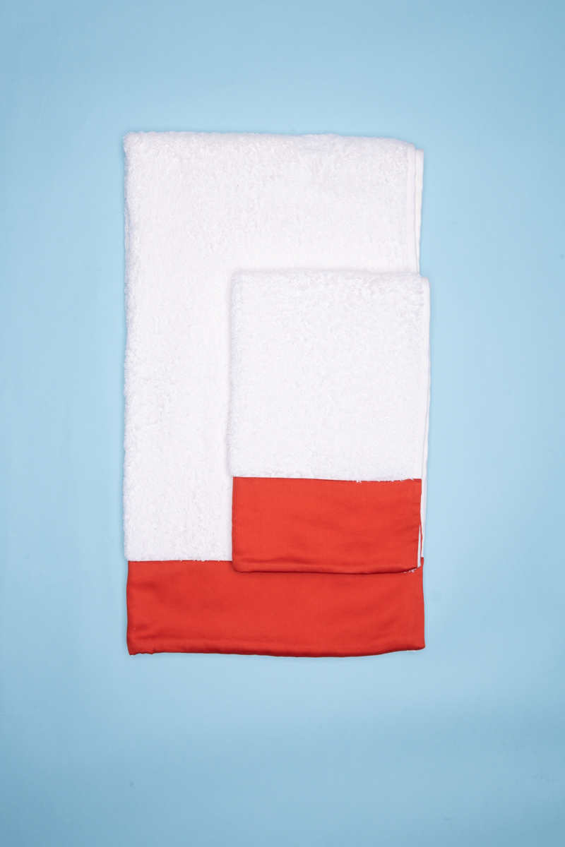 Dovì | coppia di asciugamani in spugna con bordo in tessuto corallo